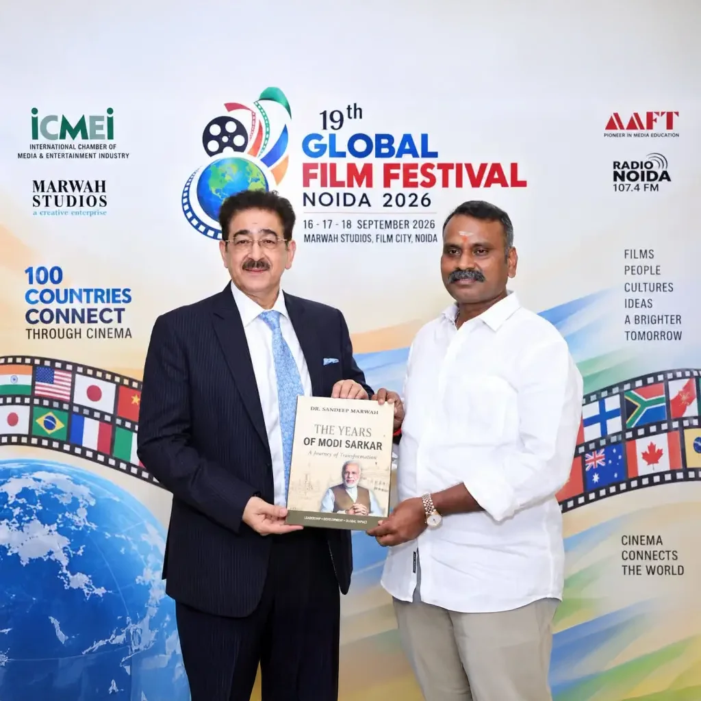 Dr. Sandeep Marwah Presents His Book on Prime Minister Narendra Modi to Union Minister Dr. L. Murugan